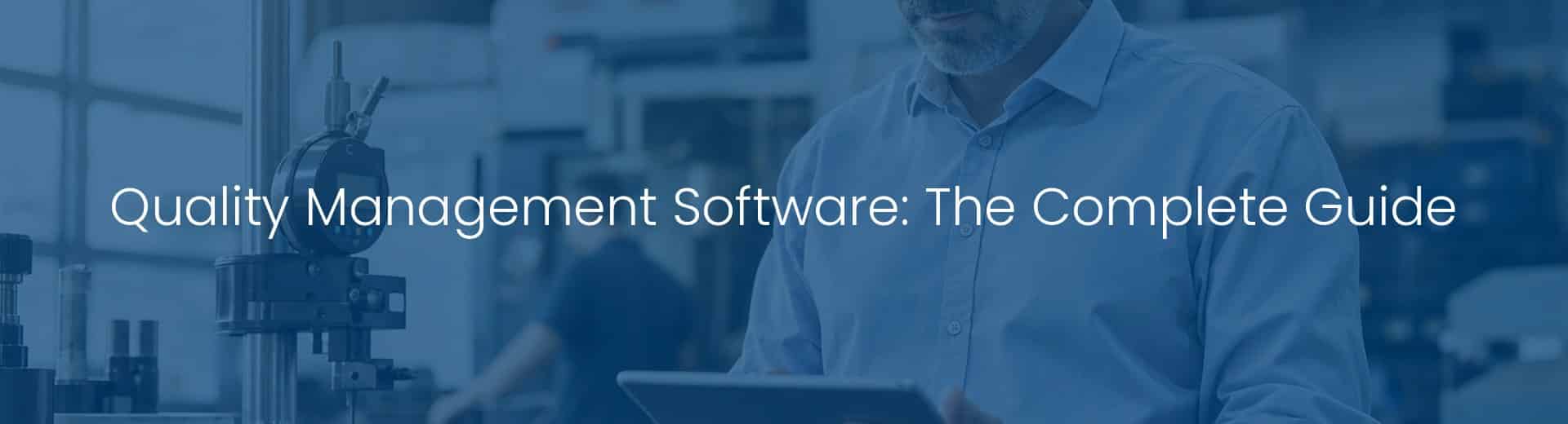 Quality leader and manufacturing engineer reviewing audit findings on a tablet at a production line — quality management software in use