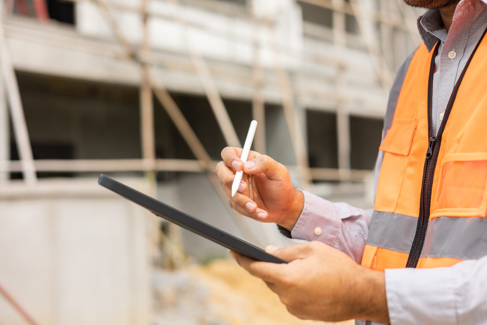 Mobile HVAC inspection checklist with Certainty Technician using a tablet to complete a digital inspection checklist at a residential property.